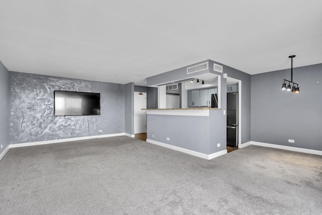 850 Wellington Ave Unit 515, Elk Grove Village, IL 60007 - unfurnished living room with baseboards and dark carpet