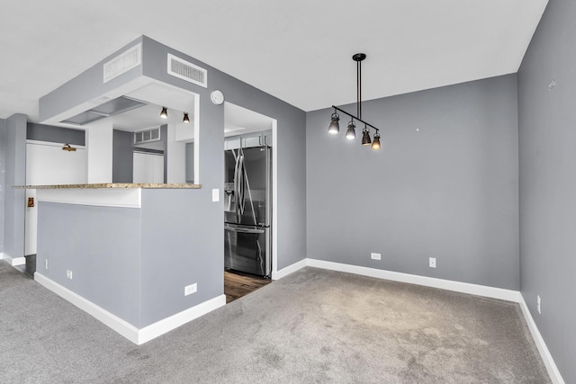 850 Wellington Ave Unit 515, Elk Grove Village, IL 60007 - unfurnished dining area featuring carpet floors and baseboards