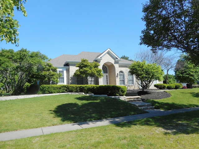 2117 Fargo Blvd, Geneva, IL 60134 - view of front of house with a front lawn and brick siding