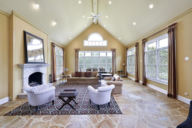 110 Inverway, Inverness, IL 60067 - living area featuring stone floors, a ceiling fan, baseboards, high vaulted ceiling, and a fireplace with raised hearth