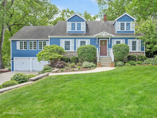 2111 Ohio St, Lisle, IL 60532 - view of front of home with an attached garage, a front yard, driveway, a chimney, and stone siding