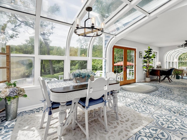 2111 Ohio St, Lisle, IL 60532 - sunroom with french doors, plenty of natural light, and a chandelier
