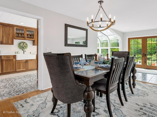 2111 Ohio St, Lisle, IL 60532 - dining space featuring a chandelier, plenty of natural light, french doors, and light wood-type flooring