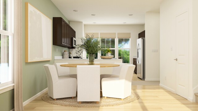 2270 Stonegate Rd, Algonquin, IL 60102 - dining area featuring light wood finished floors and baseboards