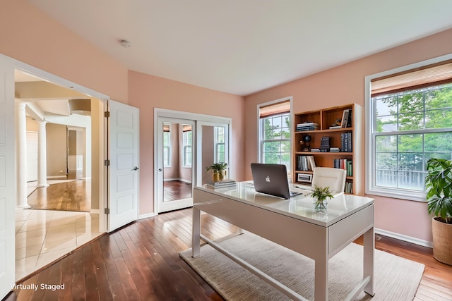 830 W Lukas Ave, Palatine, IL 60067 - office space with decorative columns, baseboards, and hardwood / wood-style floors