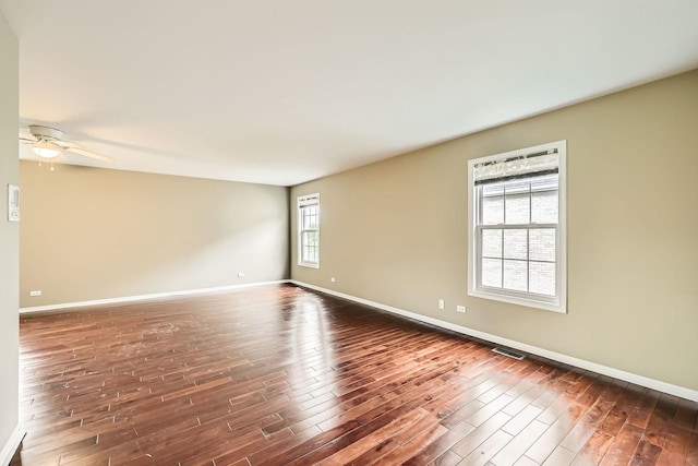 830 W Lukas Ave, Palatine, IL 60067 - unfurnished room featuring dark wood finished floors, baseboards, and a ceiling fan