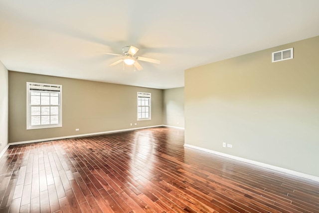 830 W Lukas Ave, Palatine, IL 60067 - unfurnished room with a ceiling fan, baseboards, and dark wood-style floors