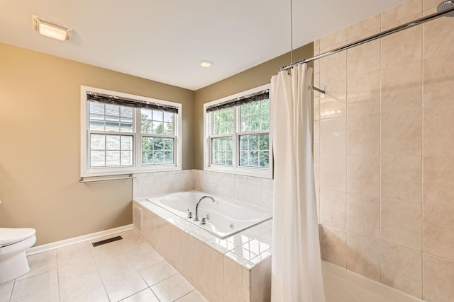 830 W Lukas Ave, Palatine, IL 60067 - full bathroom featuring toilet, a bath, tile patterned flooring, baseboards, and tiled shower