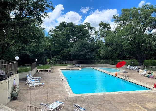 430 Walnut Ave Unit 2201, Lisle, IL 60532 - community pool featuring a patio and view of scattered trees