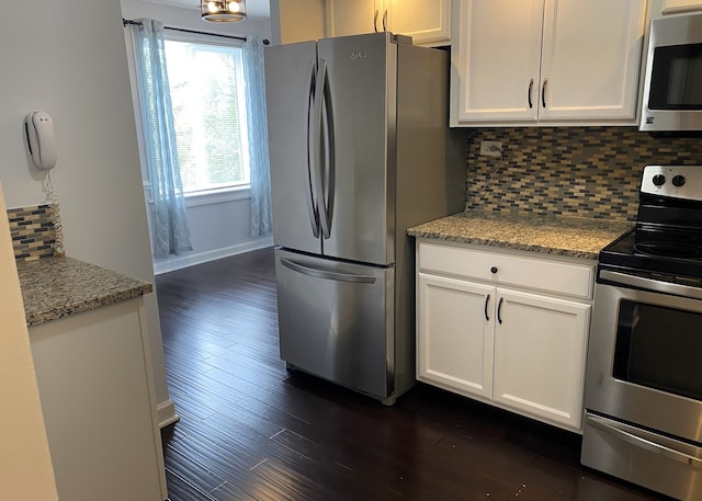 430 Walnut Ave Unit 2201, Lisle, IL 60532 - kitchen featuring stainless steel appliances, white cabinetry, decorative backsplash, dark wood finished floors, and light stone counters
