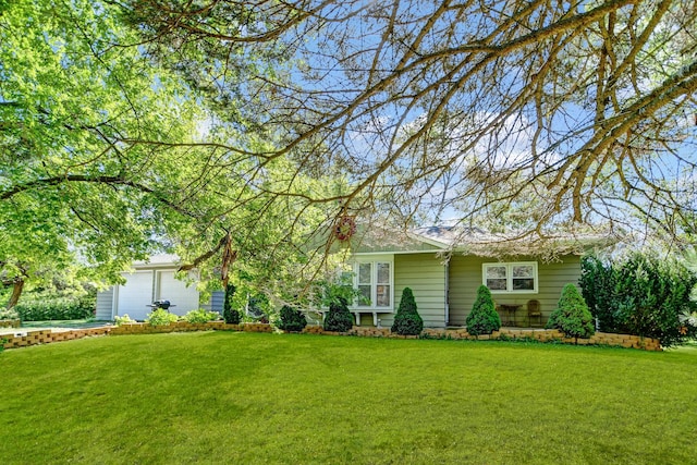 12599 S Archer Ave, Lemont, IL 60439 - view of front of house with a front lawn and an attached garage