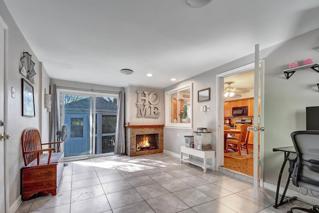 12599 S Archer Ave, Lemont, IL 60439 - tiled living area featuring baseboards, a lit fireplace, recessed lighting, and a ceiling fan
