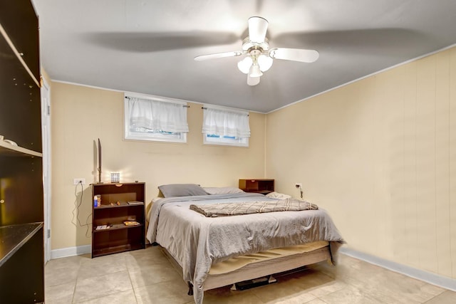 12599 S Archer Ave, Lemont, IL 60439 - tiled bedroom with a ceiling fan, baseboards, and crown molding