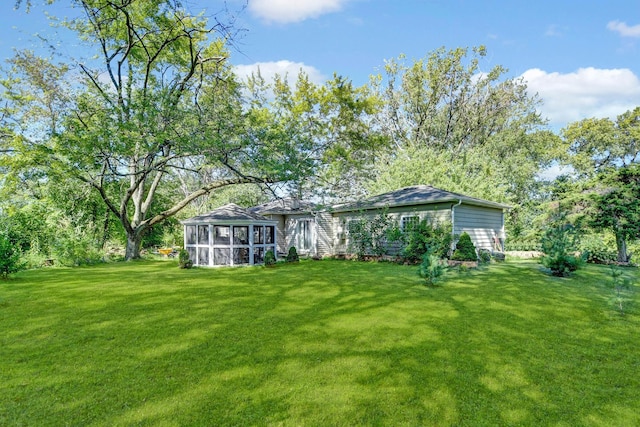 12599 S Archer Ave, Lemont, IL 60439 - view of green lawn featuring a sunroom