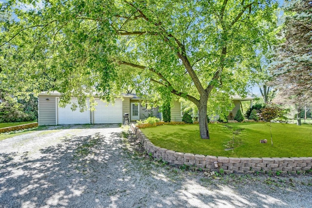 12599 S Archer Ave, Lemont, IL 60439 - obstructed view of property featuring driveway, an attached garage, and a front lawn