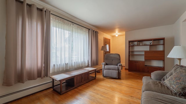 13122 S Escanaba Ave, Chicago, IL 60633 - living area with baseboard heating and light wood-style flooring