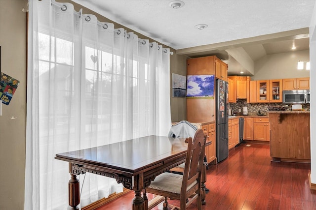 318 W Market St, Farmer City, IL 61842 - dining room with dark wood finished floors and vaulted ceiling