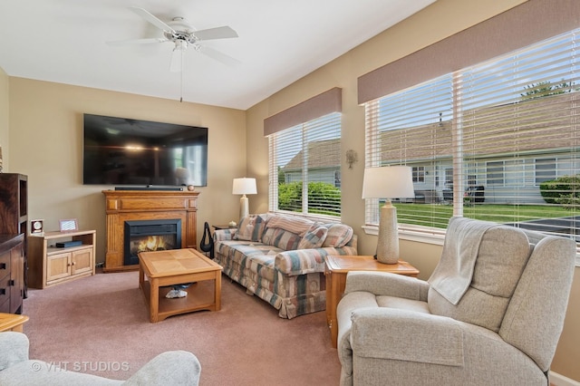 21513 W Douglas Ln, Plainfield, IL 60544 - carpeted living room featuring a ceiling fan and a glass covered fireplace