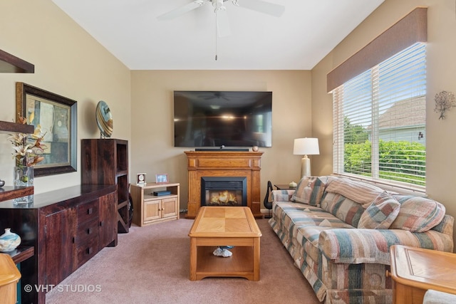 21513 W Douglas Ln, Plainfield, IL 60544 - living area with light colored carpet, a ceiling fan, and a glass covered fireplace