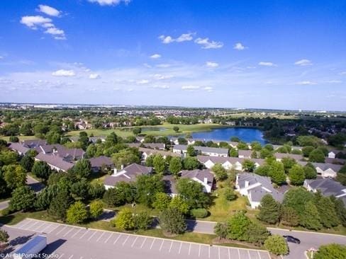 21513 W Douglas Ln, Plainfield, IL 60544 - aerial perspective of suburban area with a large body of water