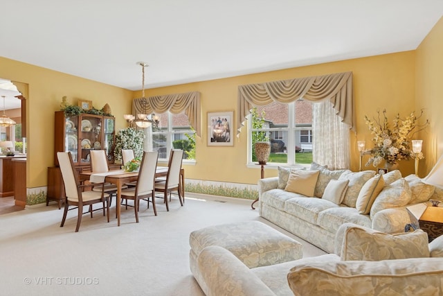 21513 W Douglas Ln, Plainfield, IL 60544 - living area featuring a chandelier and carpet