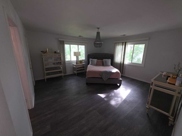 105 Marquette St, Park Forest, IL 60466 - bedroom with dark wood-style floors and baseboards