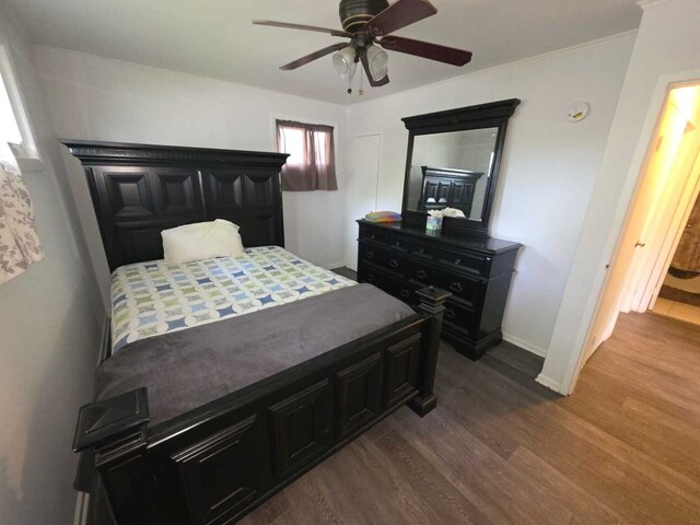 105 Marquette St, Park Forest, IL 60466 - bedroom featuring dark wood-style floors, baseboards, and a ceiling fan