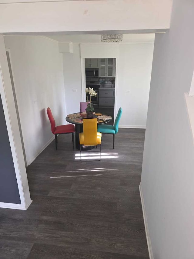 105 Marquette St, Park Forest, IL 60466 - dining room with dark wood-type flooring and baseboards