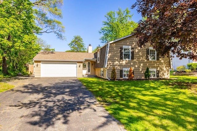 4435 Black Partridge Ln, Lisle, IL 60532 - tri-level home featuring driveway, a garage, a chimney, a front lawn, and roof with shingles