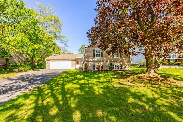 4435 Black Partridge Ln, Lisle, IL 60532 - tri-level home with driveway, a front lawn, and a garage