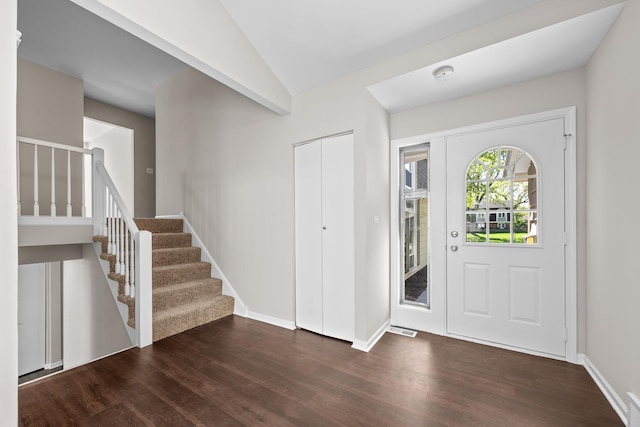 4435 Black Partridge Ln, Lisle, IL 60532 - foyer featuring wood finished floors, stairs, vaulted ceiling, and baseboards