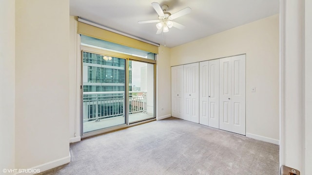 1400 S Michigan Ave Unit 1211, Chicago, IL 60605 - unfurnished bedroom with access to outside, baseboards, and carpet flooring