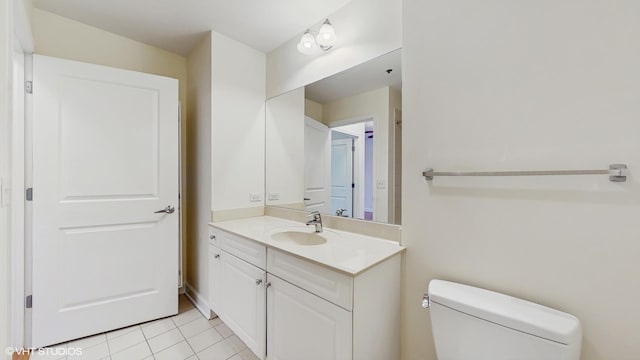 1400 S Michigan Ave Unit 1211, Chicago, IL 60605 - half bathroom featuring vanity, toilet, and tile patterned flooring