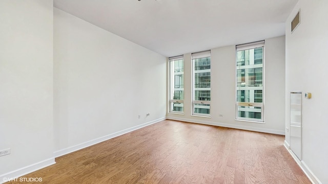 1400 S Michigan Ave Unit 1211, Chicago, IL 60605 - empty room with light wood-style flooring and baseboards