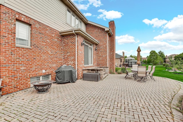 22665 Joshua Dr, Frankfort, IL 60423 - view of patio featuring area for grilling, outdoor dining space, and an outdoor fire pit