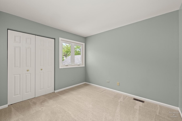 358 Bristol Ln, Fox River Grove, IL 60021 - unfurnished bedroom with carpet, baseboards, and a closet