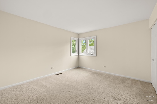 358 Bristol Ln, Fox River Grove, IL 60021 - empty room with baseboards and light carpet