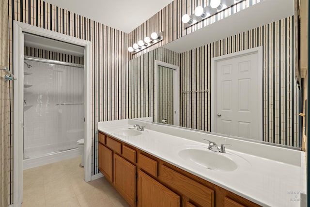 358 Bristol Ln, Fox River Grove, IL 60021 - full bath with wallpapered walls, toilet, double vanity, a shower stall, and tile patterned flooring