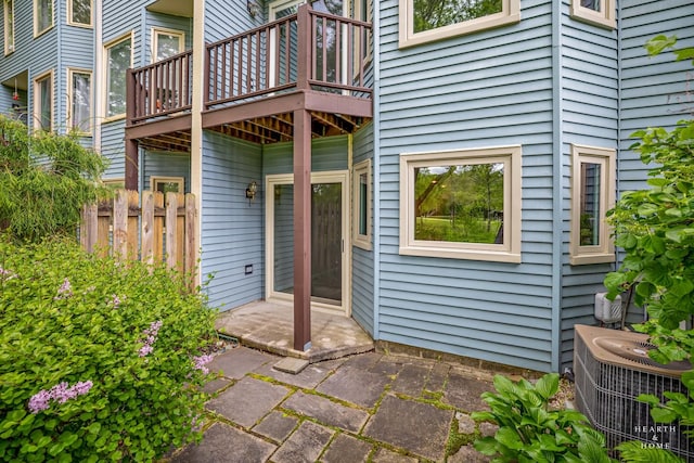 358 Bristol Ln, Fox River Grove, IL 60021 - entrance to property with central air condition unit, a patio area, and a balcony