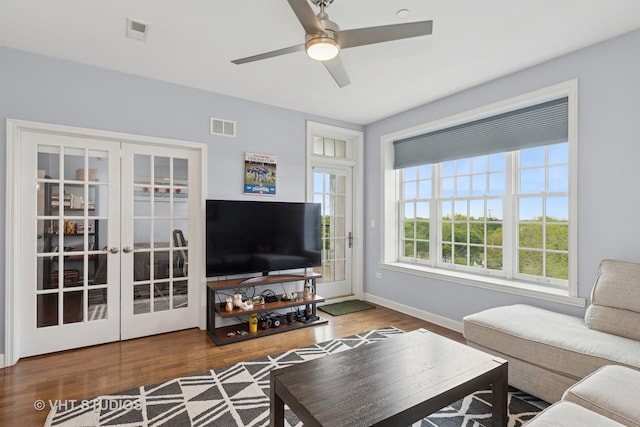 50 N Plum Grove Rd Unit 704E, Palatine, IL 60067 - living area featuring ceiling fan, wood finished floors, french doors, and baseboards