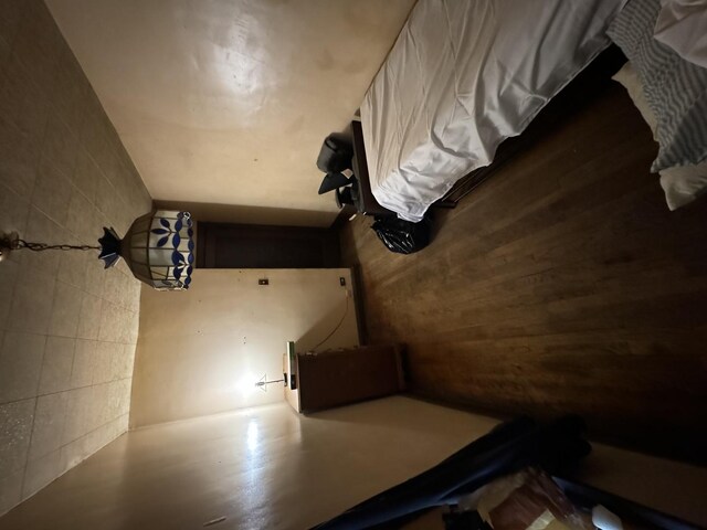 7145 S Seeley Ave, Chicago, IL 60636 - unfurnished bedroom featuring tile walls