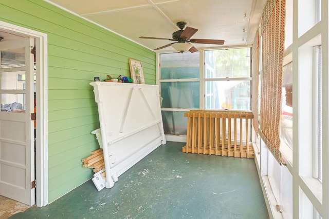 309 River Dr, Dekalb, IL 60115 - unfurnished sunroom with a ceiling fan