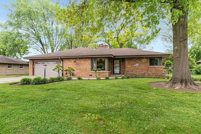 831 W Marywood Ave, Aurora, IL 60505 - view of front of property featuring brick siding, a garage, concrete driveway, a chimney, and a front yard