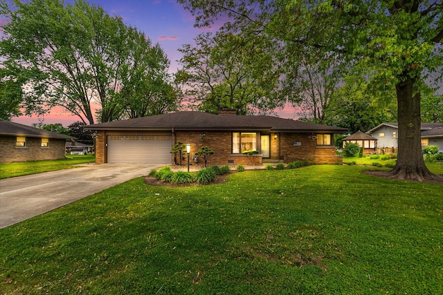 831 W Marywood Ave, Aurora, IL 60505 - view of front of property with an attached garage, driveway, a chimney, a front lawn, and brick siding