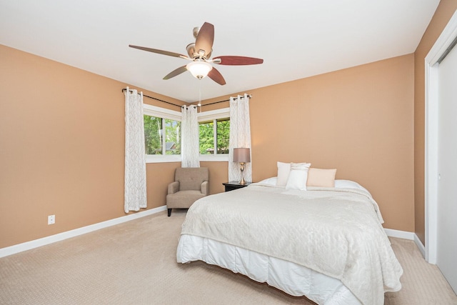 831 W Marywood Ave, Aurora, IL 60505 - bedroom with light carpet, baseboards, and ceiling fan