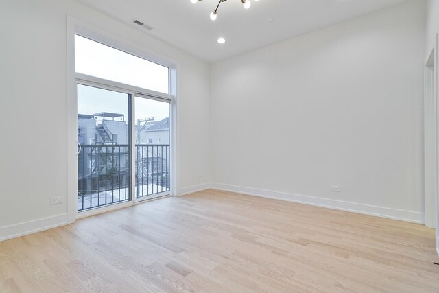 2417 W Walton St Unit 3, Chicago, IL 60622 - spare room featuring light wood-type flooring, baseboards, and recessed lighting