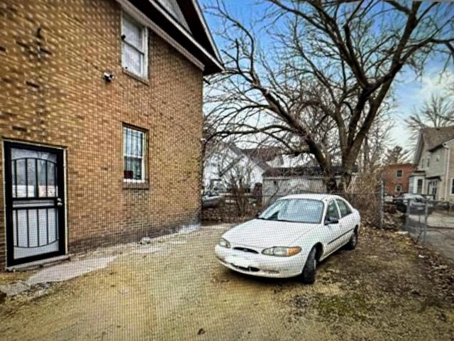 312 N Longwood St Unit 312, Rockford, IL 61107 - view of side of home with brick siding