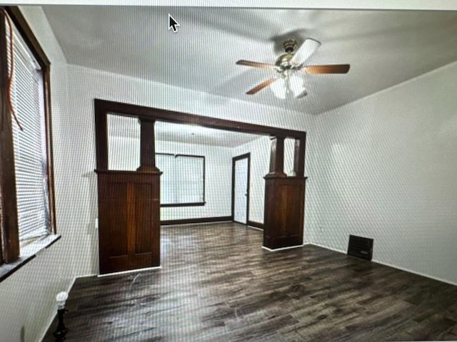 312 N Longwood St Unit 312, Rockford, IL 61107 - empty room featuring a ceiling fan and dark wood-style floors