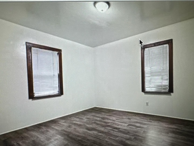 312 N Longwood St Unit 312, Rockford, IL 61107 - spare room featuring dark wood finished floors