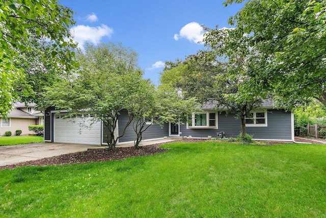 5S542 Tartan Ln, Naperville, IL 60563 - obstructed view of property with a front lawn, driveway, and an attached garage